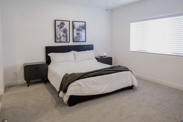 324 Sunset Dr S, Madera, CA 93636 - bedroom with light colored carpet and baseboards