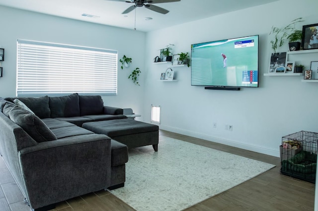 324 Sunset Dr S, Madera, CA 93636 - living room with ceiling fan, wood finished floors, and baseboards