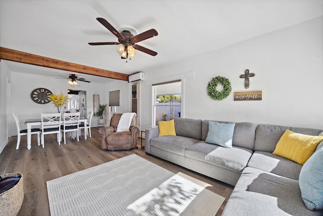 261 Belmont Rd, Exeter, CA 93221 - living room featuring beamed ceiling, a wall mounted air conditioner, a ceiling fan, and wood finished floors