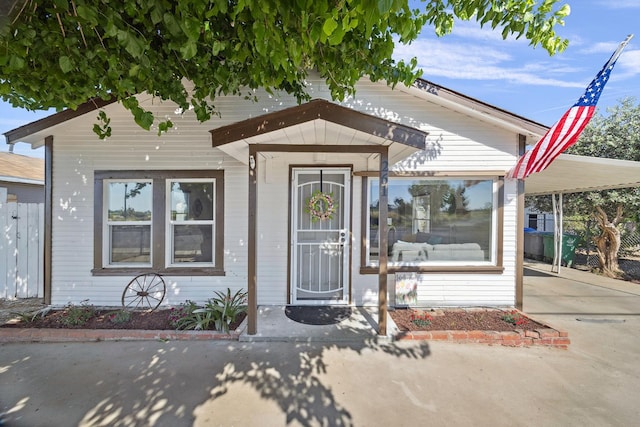 261 Belmont Rd, Exeter, CA 93221 - view of front of property with concrete driveway and fence