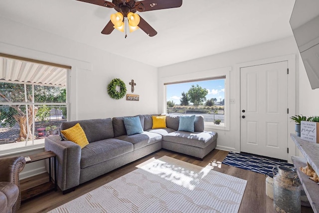 261 Belmont Rd, Exeter, CA 93221 - living area with healthy amount of natural light, wood finished floors, and a ceiling fan