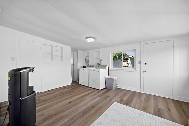 261 Belmont Rd, Exeter, CA 93221 - clothes washing area with wood finished floors and independent washer and dryer