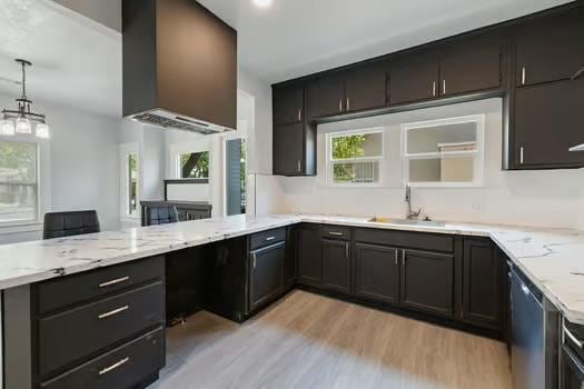 705 Poplar, Fresno, CA 93728 - kitchen with dishwasher, a peninsula, light wood-style floors, light stone countertops, and recessed lighting