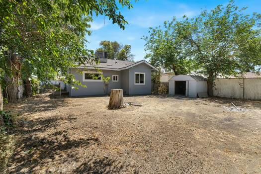705 Poplar, Fresno, CA 93728 - rear view of property featuring stucco siding