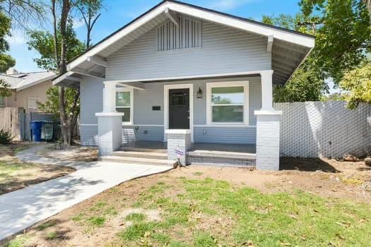705 Poplar, Fresno, CA 93728 - bungalow-style home featuring covered porch