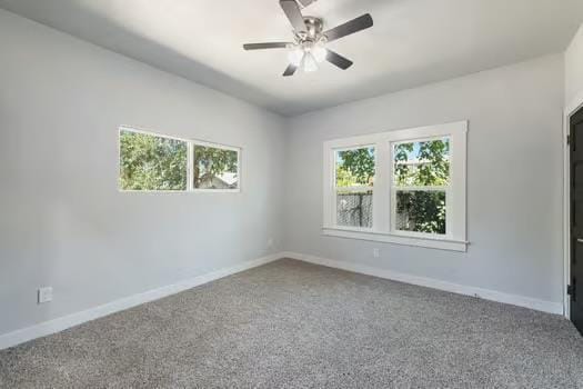 705 Poplar, Fresno, CA 93728 - carpeted spare room with plenty of natural light, a ceiling fan, and baseboards