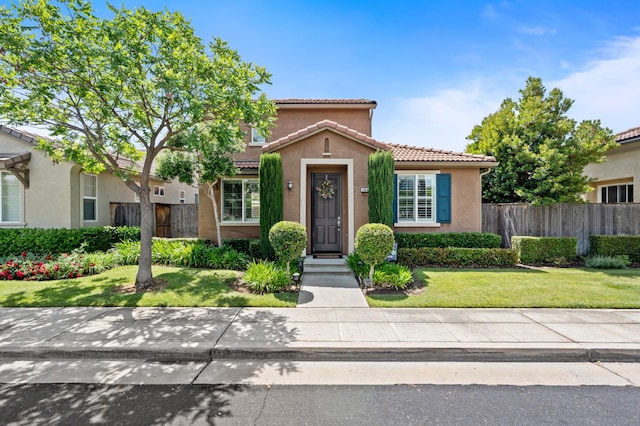 3942 Harlan Ranch Blvd, Clovis, CA 93619 - view of front of house featuring a tiled roof and stucco siding