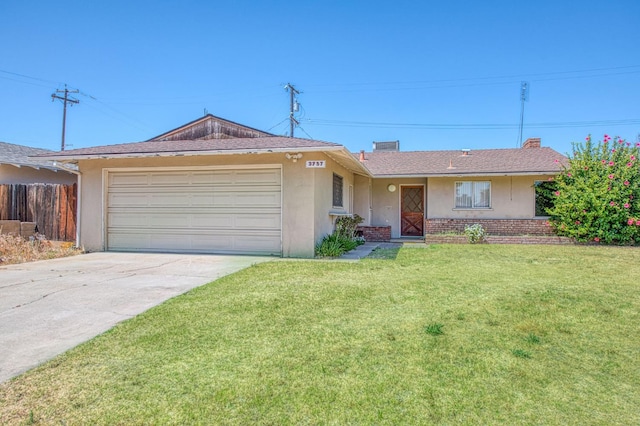 3757 E Farrin Ave, Fresno, CA 93726 - ranch-style house featuring a garage, driveway, stucco siding, and brick siding