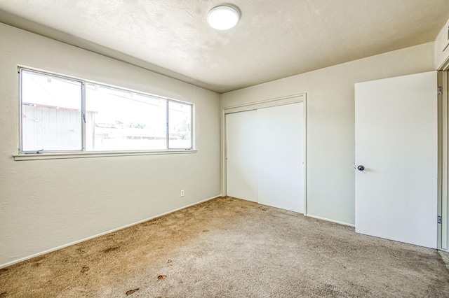 3757 E Farrin Ave, Fresno, CA 93726 - unfurnished bedroom featuring carpet floors and a closet