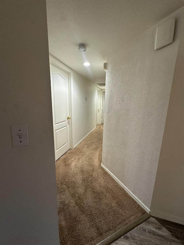 5838 W Fallon Ave, Fresno, CA 93722 - hall featuring baseboards and carpet floors
