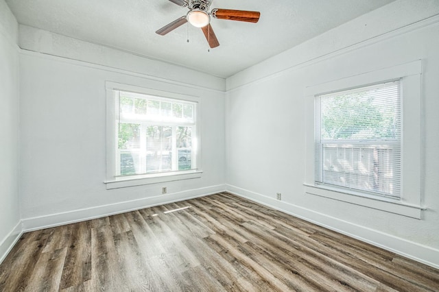 1010 N Ferger Ave, Fresno, CA 93728 - spare room featuring wood finished floors, baseboards, and ceiling fan