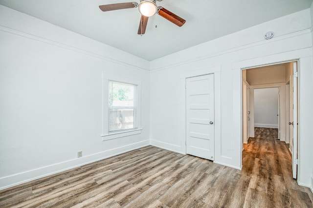 1010 N Ferger Ave, Fresno, CA 93728 - empty room featuring wood finished floors, ceiling fan, baseboards, and a smoke detector