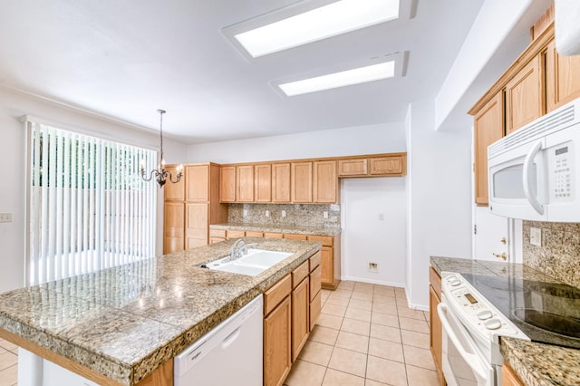 83 W Bohemia Ln, Clovis, CA 93619 - kitchen featuring white appliances, a sink, tile counters, and tasteful backsplash