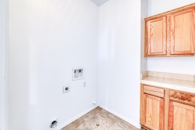 83 W Bohemia Ln, Clovis, CA 93619 - laundry area with washer hookup, hookup for an electric dryer, cabinet space, and baseboards