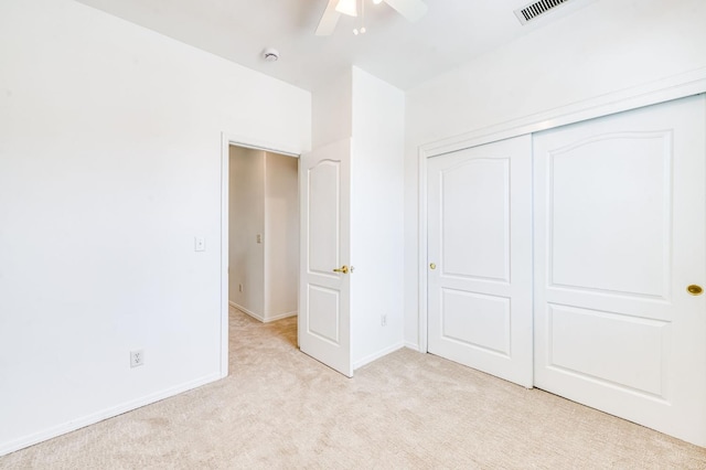 83 W Bohemia Ln, Clovis, CA 93619 - unfurnished bedroom featuring light carpet, a closet, baseboards, and ceiling fan
