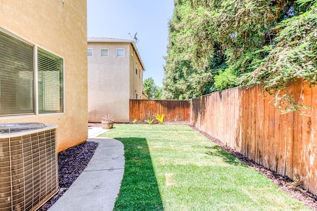 83 W Bohemia Ln, Clovis, CA 93619 - view of yard with central AC unit