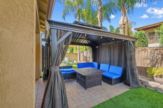 993 Pinewood Ave, Sanger, CA 93657 - fenced backyard featuring a gazebo, an outdoor living space, and a patio