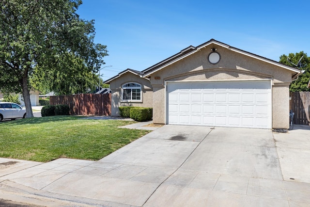single story home with stucco siding, a garage, and concrete driveway
