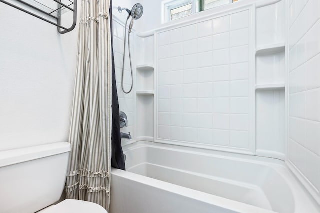 bathroom with toilet and shower / bath combination with curtain