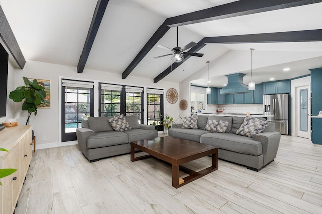 6608 N Haslam Ave, Fresno, CA 93711 - living room featuring light wood-style floors, ceiling fan, baseboards, and recessed lighting