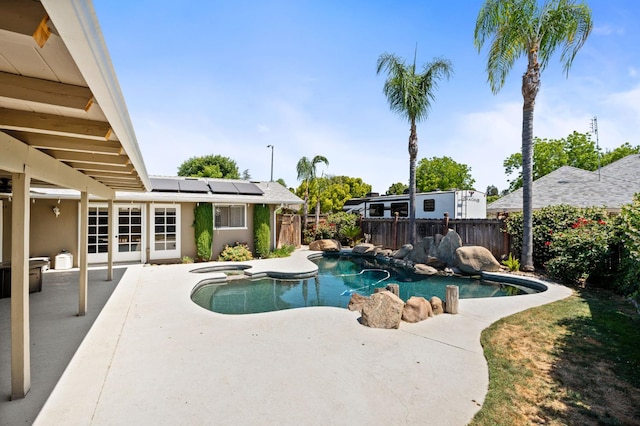6608 N Haslam Ave, Fresno, CA 93711 - view of swimming pool with a fenced backyard, a patio area, french doors, and a pool with connected hot tub
