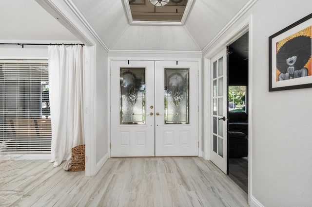 6608 N Haslam Ave, Fresno, CA 93711 - foyer entrance with french doors, wood finished floors, vaulted ceiling, crown molding, and baseboards