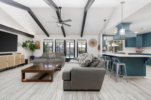 6608 N Haslam Ave, Fresno, CA 93711 - living room featuring ceiling fan, light wood-style flooring, and french doors