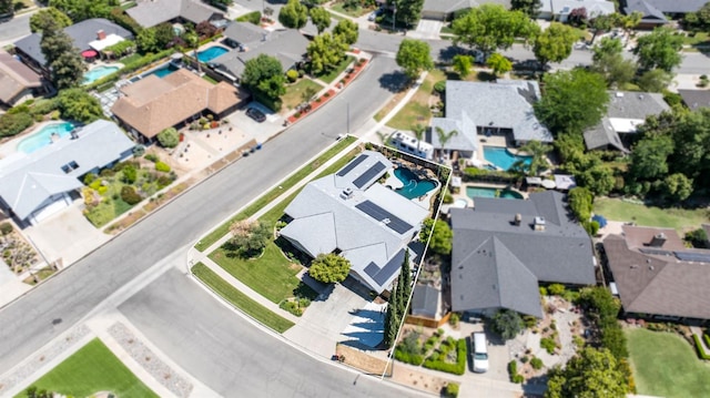6608 N Haslam Ave, Fresno, CA 93711 - aerial perspective of suburban area with a pool area