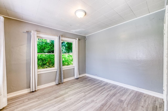 1934 N Vagedes Ave, Fresno, CA 93705 - empty room featuring wood finished floors and baseboards