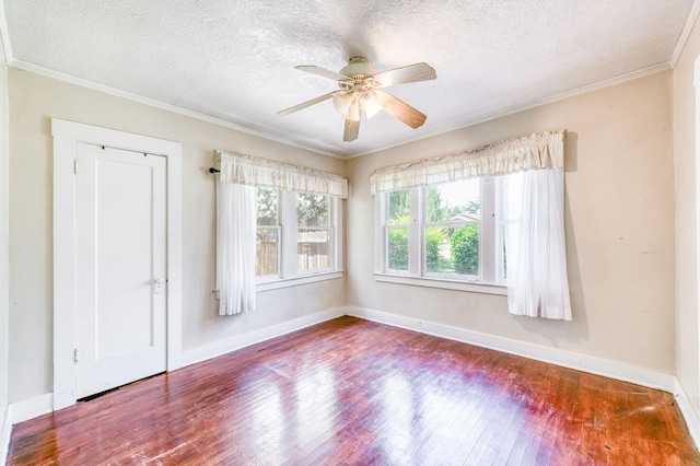 1934 N Vagedes Ave, Fresno, CA 93705 - spare room with a textured ceiling, wood-type flooring, crown molding, ceiling fan, and baseboards