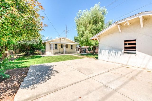 1934 N Vagedes Ave, Fresno, CA 93705 - rear view of property featuring a patio area and stucco siding