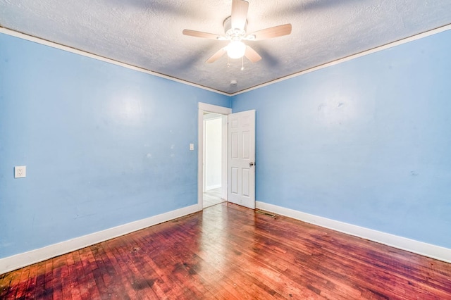 1934 N Vagedes Ave, Fresno, CA 93705 - empty room with a textured ceiling, a ceiling fan, wood finished floors, baseboards, and ornamental molding