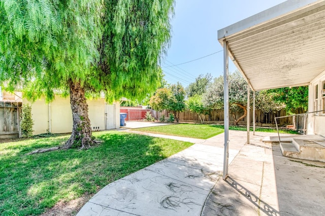 1934 N Vagedes Ave, Fresno, CA 93705 - view of yard with a patio
