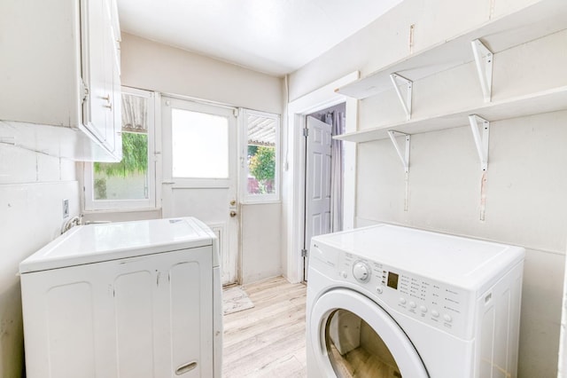 1934 N Vagedes Ave, Fresno, CA 93705 - laundry area with washing machine and clothes dryer and light wood-type flooring