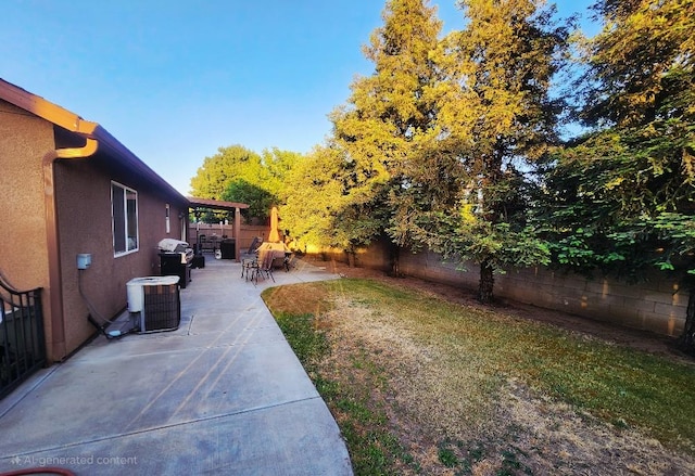 5788 E Mono St, Fresno, CA 93727 - view of yard featuring a patio and central air condition unit