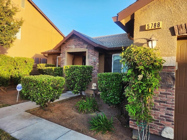 5788 E Mono St, Fresno, CA 93727 - entrance to property featuring stone siding