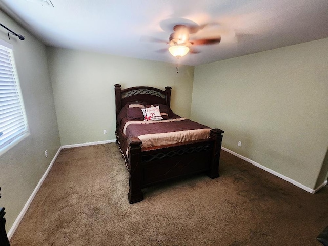 5788 E Mono St, Fresno, CA 93727 - bedroom with carpet, multiple windows, a ceiling fan, and baseboards