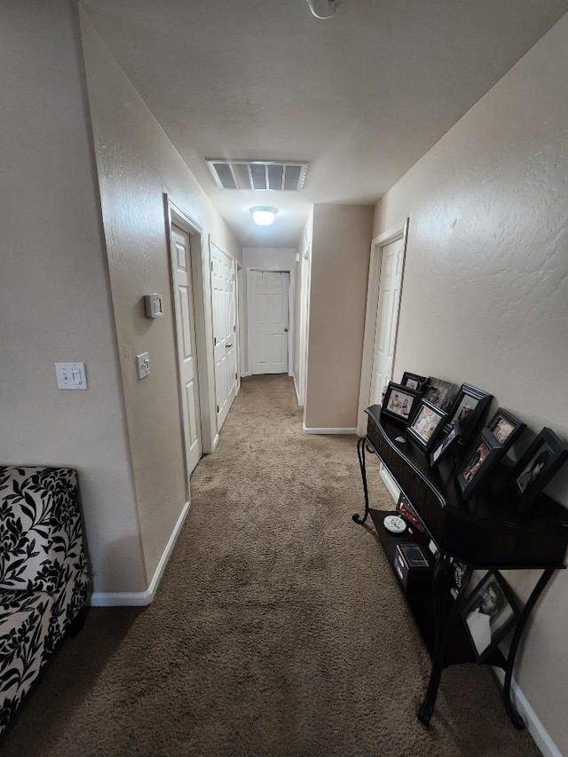 5788 E Mono St, Fresno, CA 93727 - corridor featuring carpet and baseboards