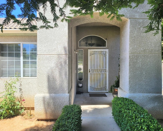 3426 W Tenaya Way, Fresno, CA 93711 - view of exterior entry featuring stucco siding