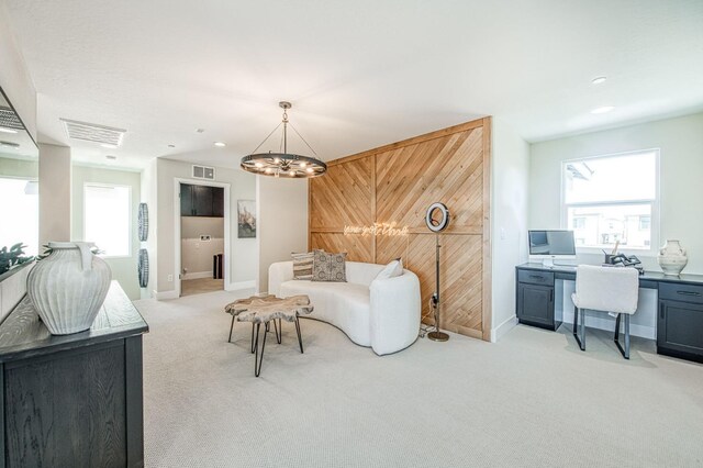1165 Maclure Ave W, Madera, CA 93636 - living room with light carpet, a chandelier, an office area, baseboards, and recessed lighting