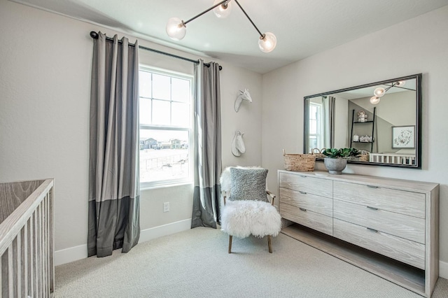 1165 Maclure Ave W, Madera, CA 93636 - living area featuring healthy amount of natural light, carpet floors, and baseboards