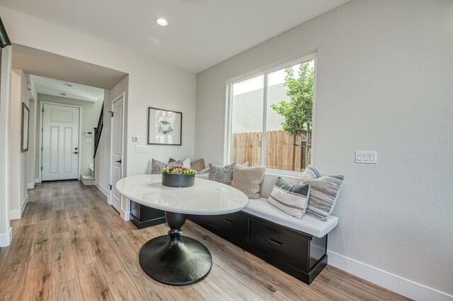 1165 Maclure Ave W, Madera, CA 93636 - dining room with baseboards, light wood-style floors, and recessed lighting