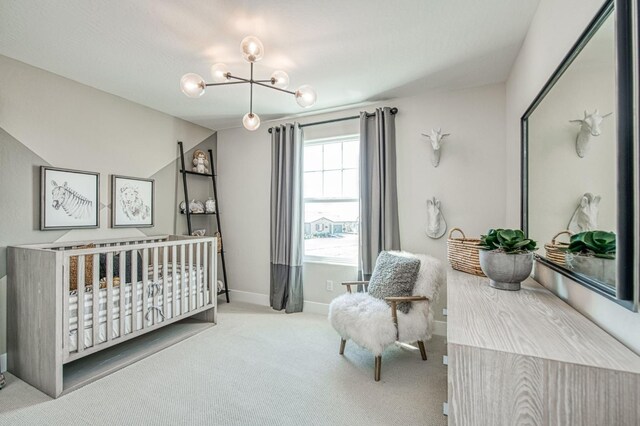 1165 Maclure Ave W, Madera, CA 93636 - bedroom with a chandelier, carpet, and baseboards