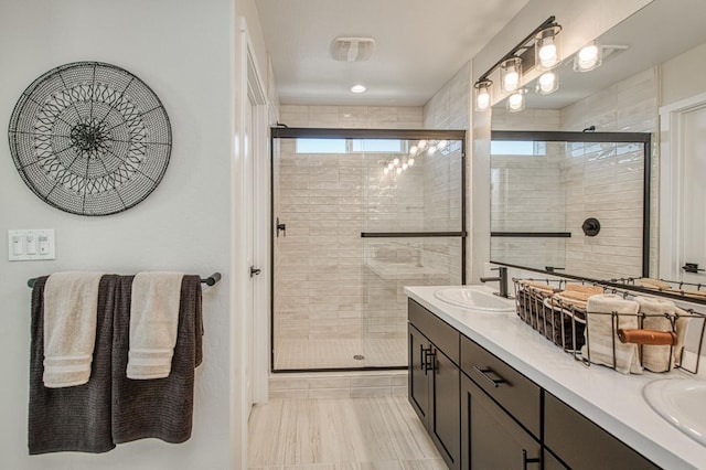 1165 Maclure Ave W, Madera, CA 93636 - bathroom featuring a stall shower and double vanity