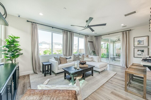 1165 Maclure Ave W, Madera, CA 93636 - living area featuring a ceiling fan, light wood-style floors, baseboards, and recessed lighting