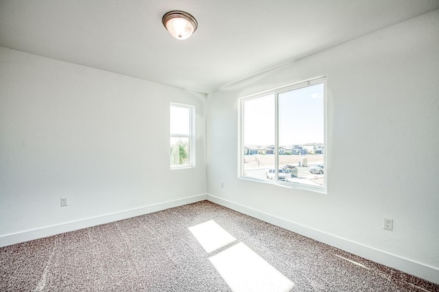 1175 Maclure Ave W, Madera, CA 93636 - empty room featuring baseboards and carpet floors