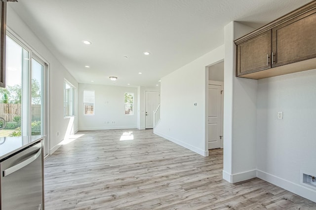 1175 Maclure Ave W, Madera, CA 93636 - unfurnished room featuring light wood-style floors, recessed lighting, and baseboards