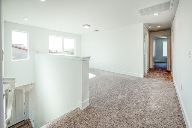 1175 Maclure Ave W, Madera, CA 93636 - corridor featuring an upstairs landing, carpet floors, baseboards, and recessed lighting