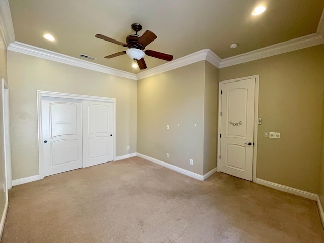 16052 W Middleton Ave, Kerman, CA 93630 - unfurnished bedroom with crown molding, carpet floors, baseboards, recessed lighting, and a closet