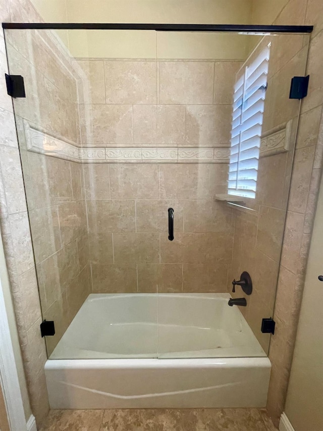 16052 W Middleton Ave, Kerman, CA 93630 - bathroom with baseboards and enclosed tub / shower combo